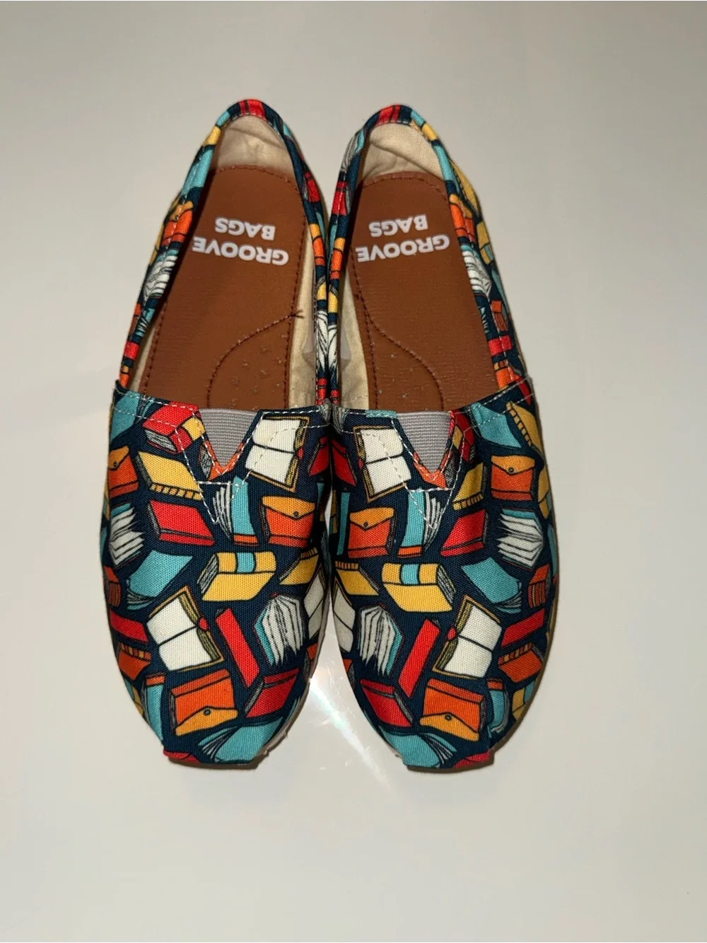 groove Kids Moccasins in Teal, Red, Yellow & White Book Print